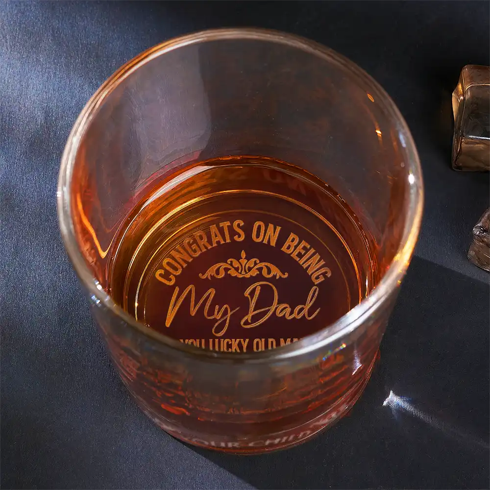 Personalized whiskey glass with 'Congrats on being my Dad' engraving, ideal Father's Day gift