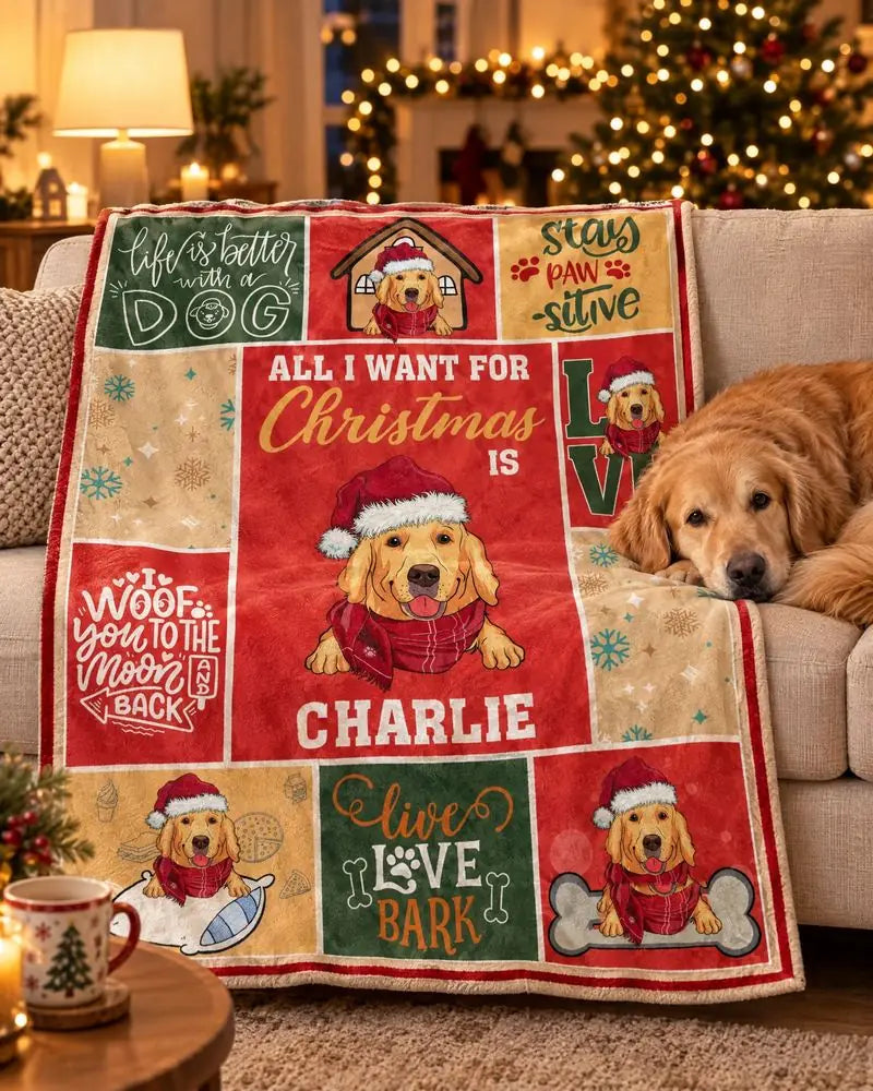 Golden retriever on a couch next to a personalized Christmas dog blanket with the name Charlie