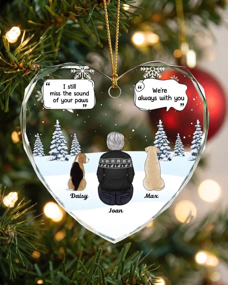 Personalized glass heart pet memorial ornament hanging on a Christmas tree